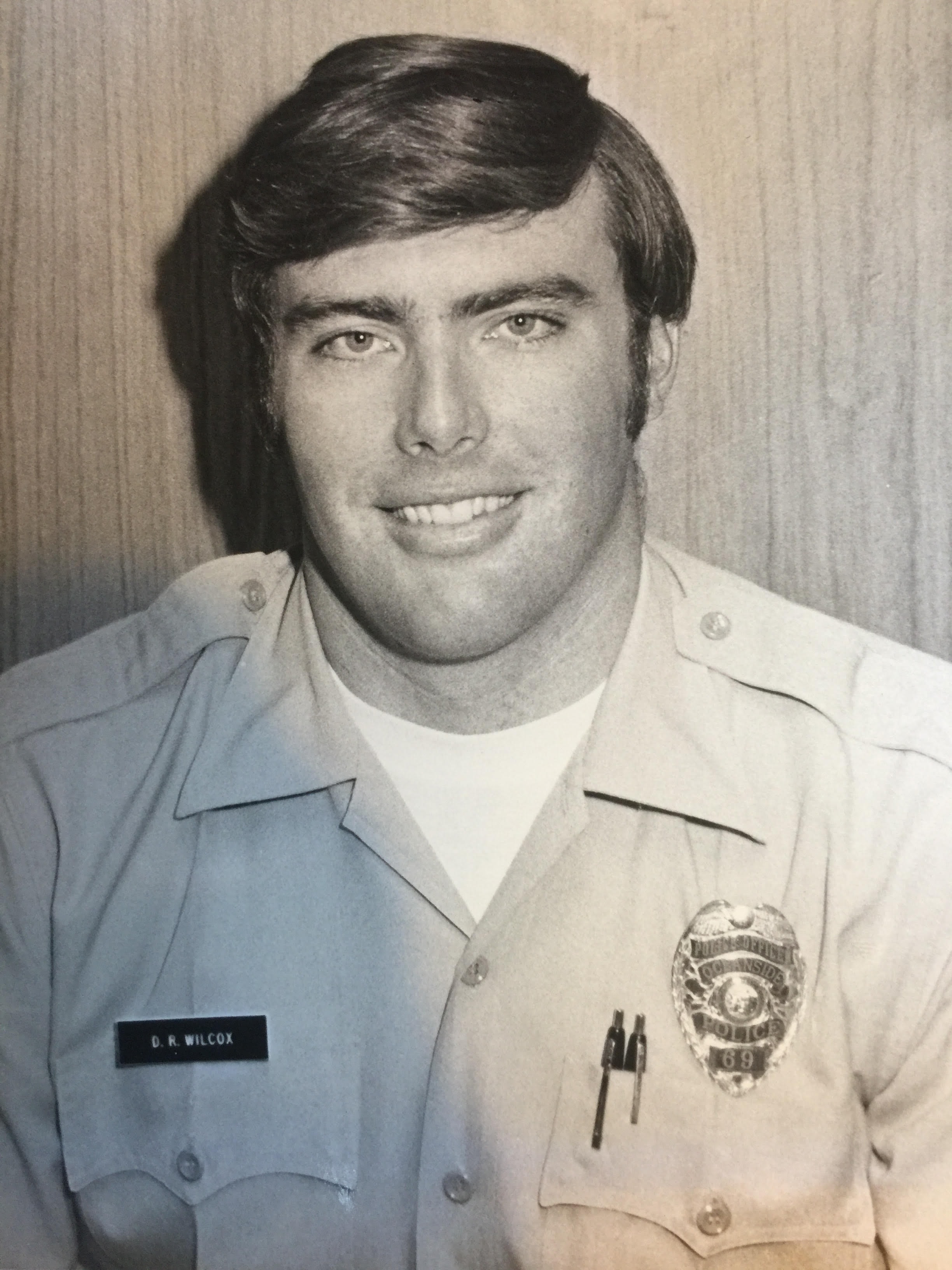 Vintage portrait of David R. Wilcox in police uniform